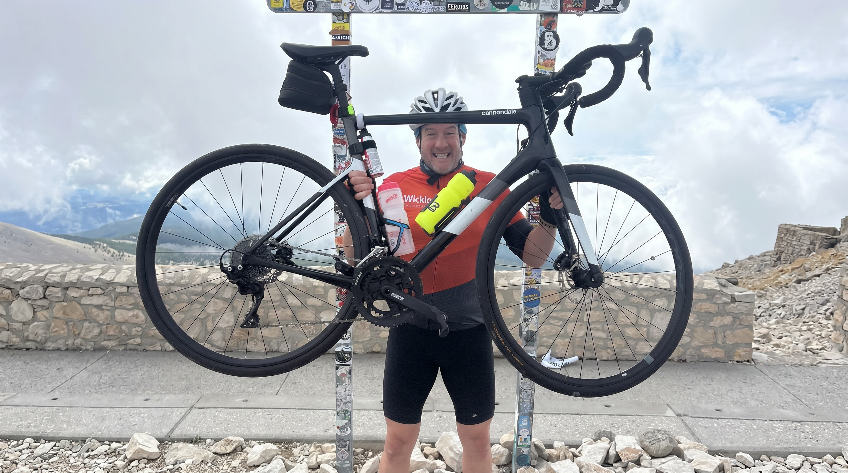 Colin McGhee with bike at summit